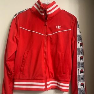 Red champion jacket with lettering